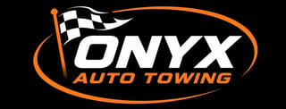 Onyx Auto Towing logo with checkered flag and orange oval design on black background