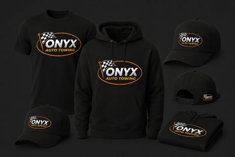 Collection of black ONYX Auto Towing branded merchandise including t-shirt, hoodie, baseball caps, and beanie with gold and white logo